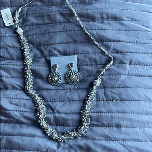 Brand new necklace and matching earrings